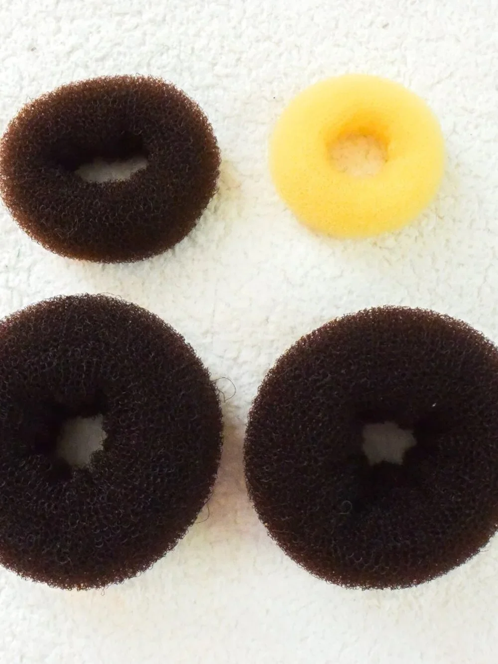 Hair Donut Bun Makers - Variety of sizes.